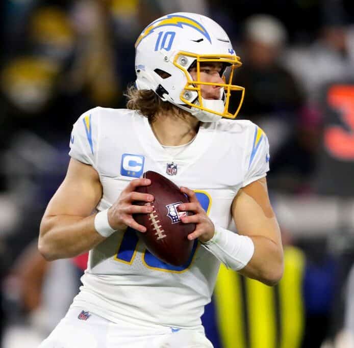 Justin Herbert drops back to throw